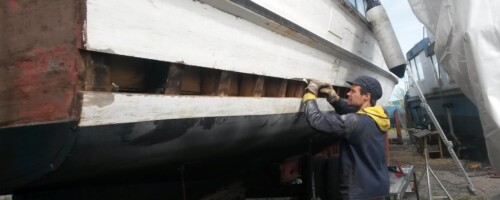 Planking repairs on 15m water taxi boat
